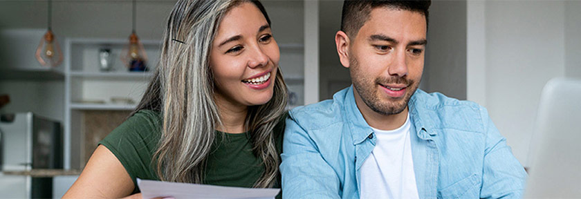 Young couple budgeting for mortgage, mobile view, Aug2023 blog, Travis CU,