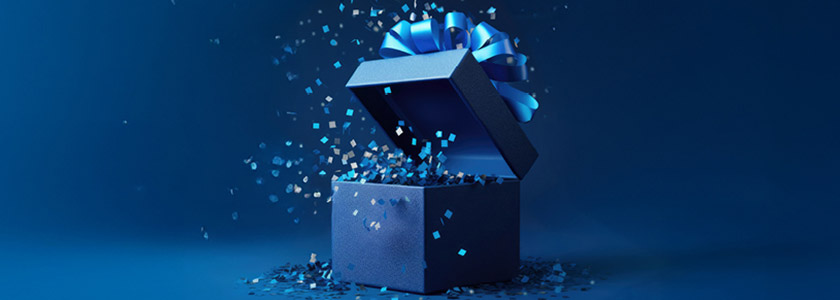 blue present, ribbon bow and confetti on dark backdrop, mobile view, Travis CU,